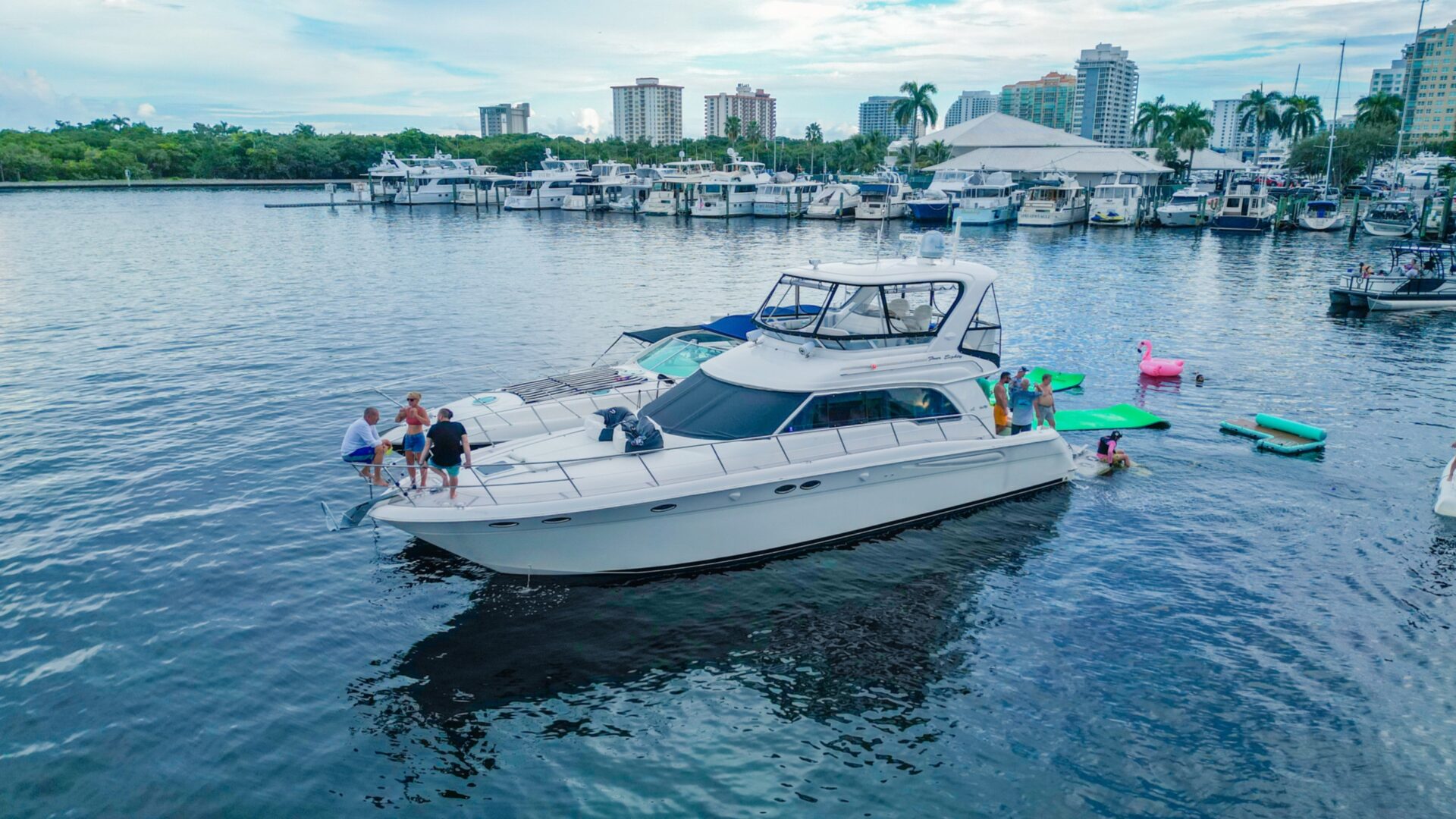 Private yacht charter swimming in Fort Lauderdale with available float mattress and pool noodles